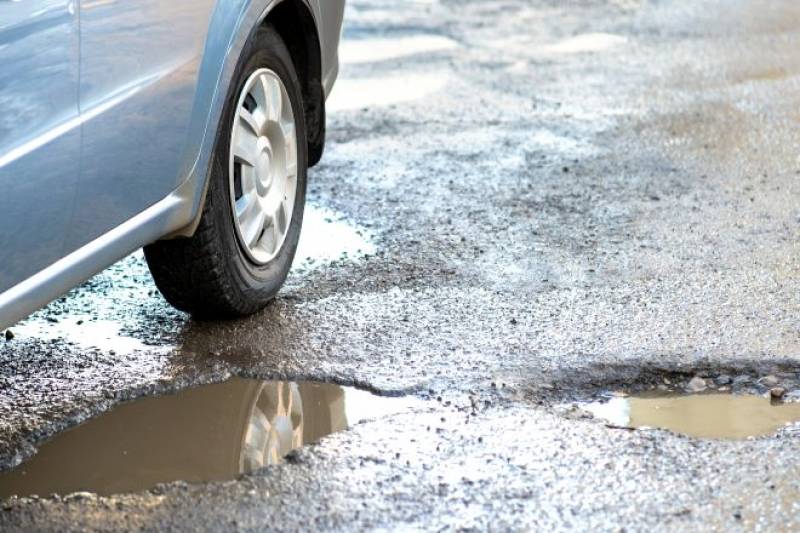 Community volunteers repair Camposol potholes as road project advances